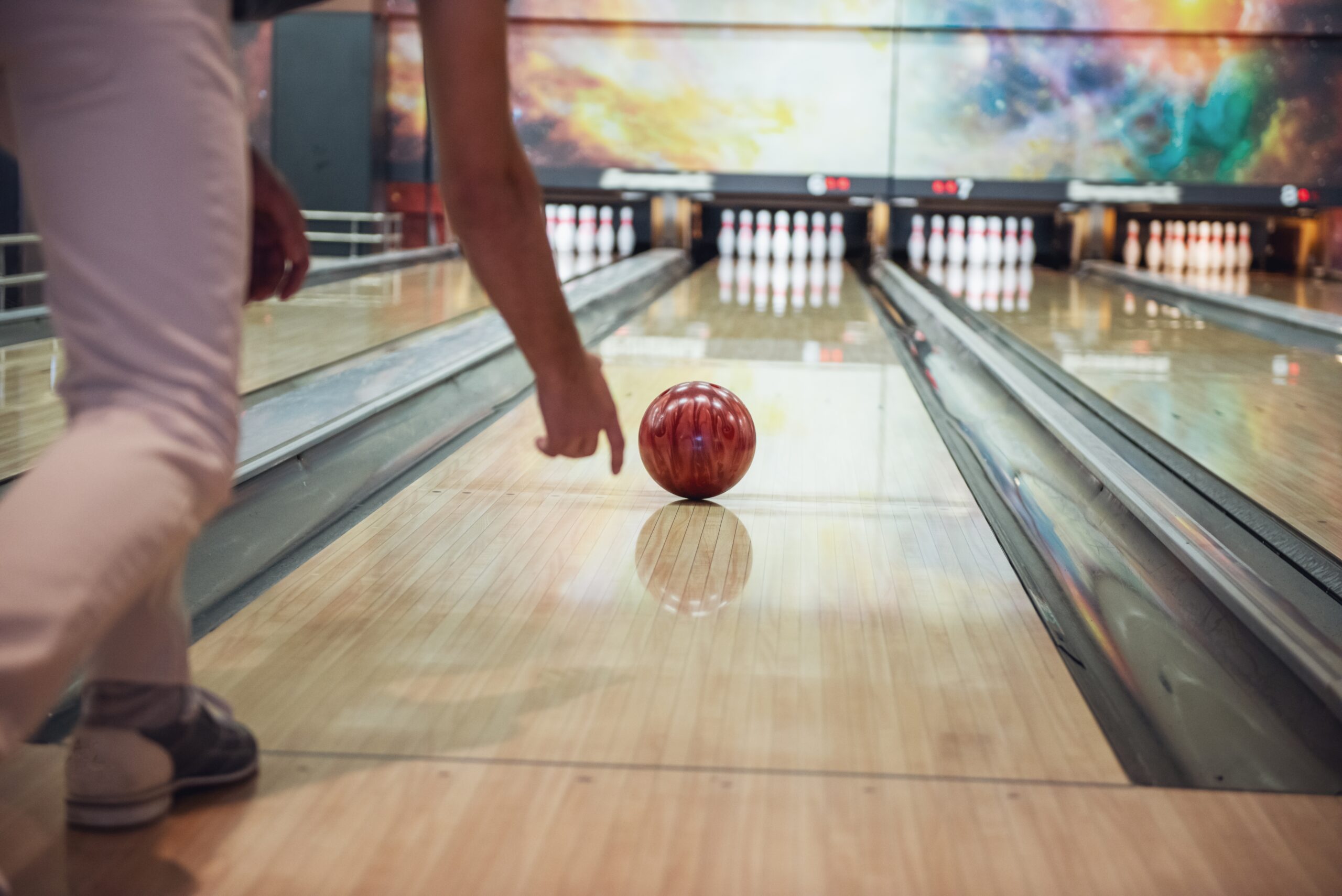 a woman playing bowling